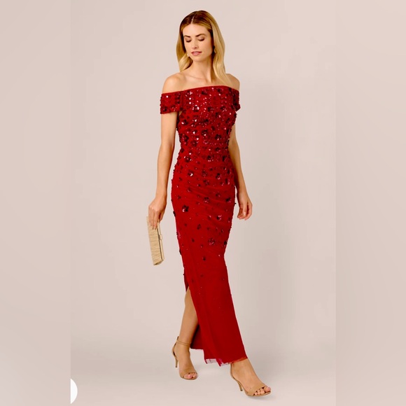 ADRIANNA PAPELL
OFF SHOULDER DRESS WITH FLORAL EMBELLISHMENT IN CRANBERRY - Picture 1 of 4